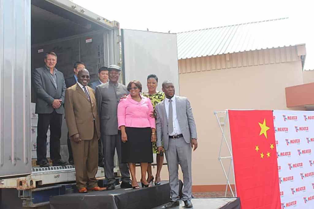 Dignitaries at the truck of premium beef off to China