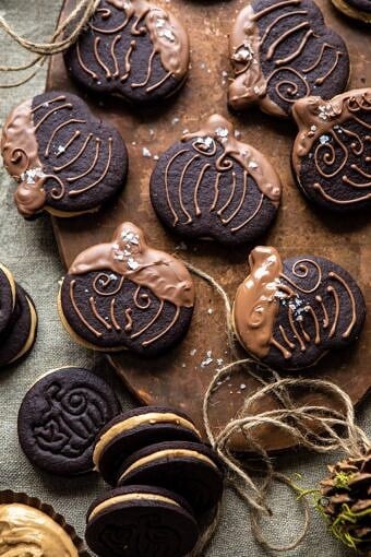 Peanut Butter Stuffed Chocolate Jack-O’-Lantern Cookies | halfbakedharvest.com #peanutbbutter #chocolate #cookies #halloween #thanksgiving