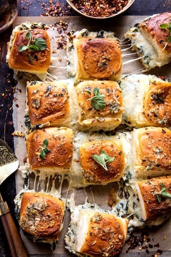 Pull Apart Garlic Butter Spinach and Artichoke Dip Sliders | halfbakedharvest.com