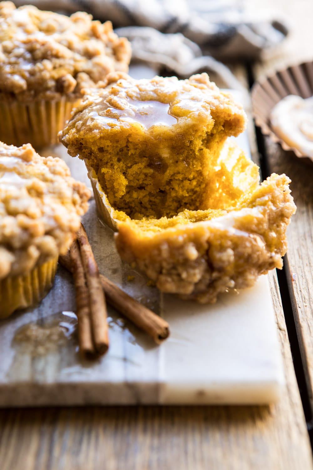 Pumpkin Coffee Cake Muffins with Cinnamon Honey Butter | halfbakedharvest.com #pumpkin #breakfast #easyrecipes #autumnrecipes #fall #thanksgiving